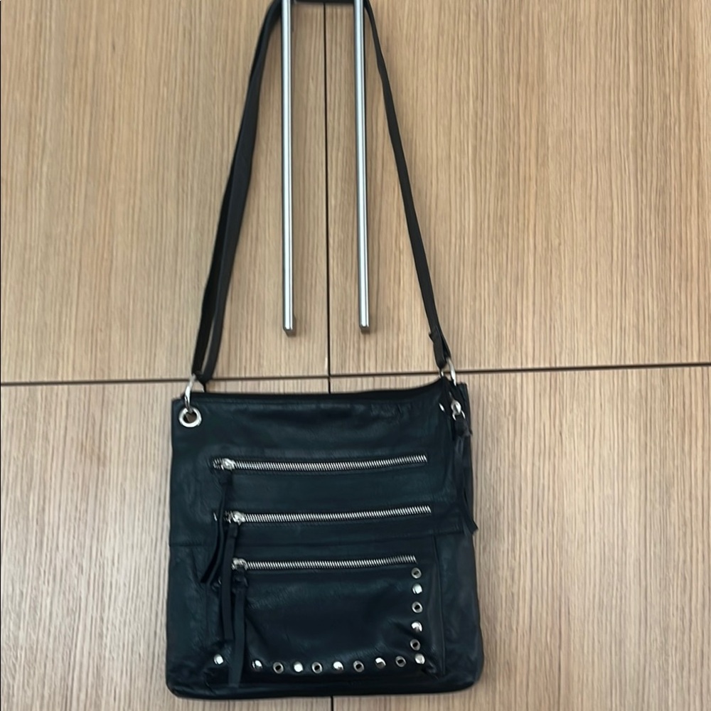 Black leather Crossbody bag with silver hardware and stud design multiple pocket